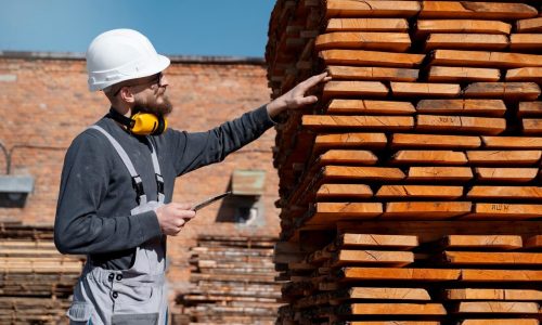 hombre-trabajando-almacen-tableros-mdf_23-2149384859-1